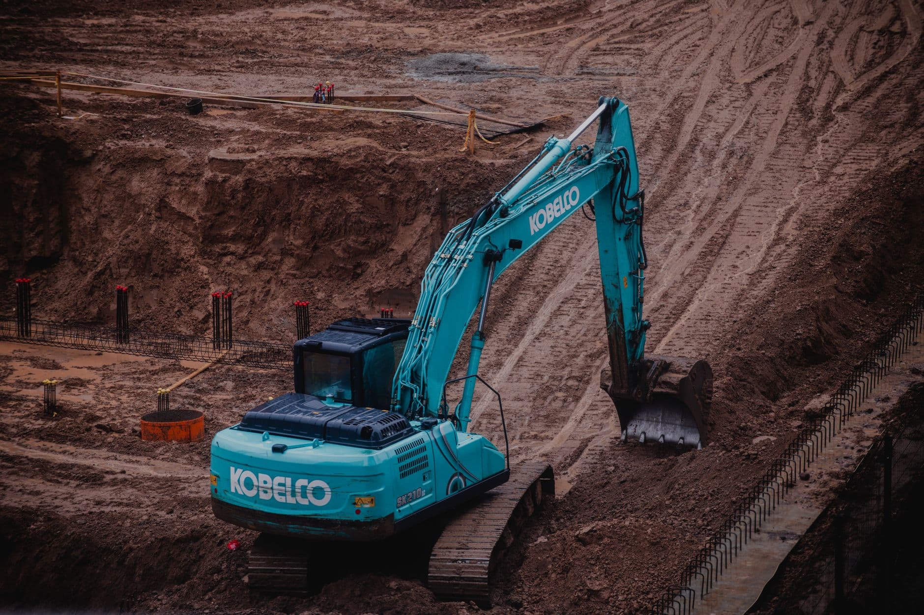 Excavator moving earth on a Central Florida site development project